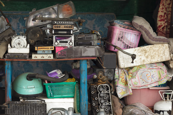 cluttered storage items stack on top of one another