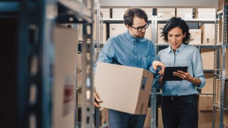 contractors discussing logistics in a storage unit